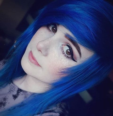 Asymmetrical cut blue hair